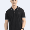 Man in navy short-sleeved polo t-shirt with contrast trim