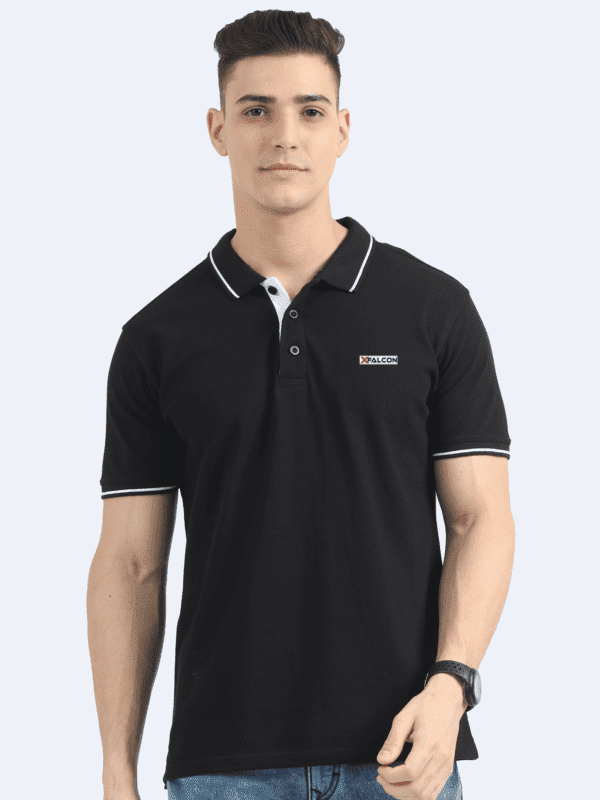 Man in navy short-sleeved polo t-shirt with contrast trim