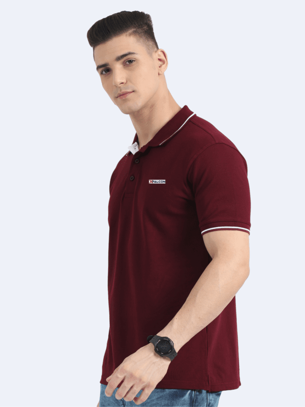 Man in maroon short-sleeve polo tee with white collar trim