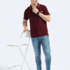 Man’s back in a maroon polo shirt with stylish white piping